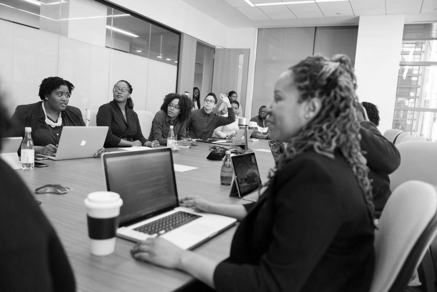 Financial analysis workspace showing charts and documents representing our methodical approach to trading education