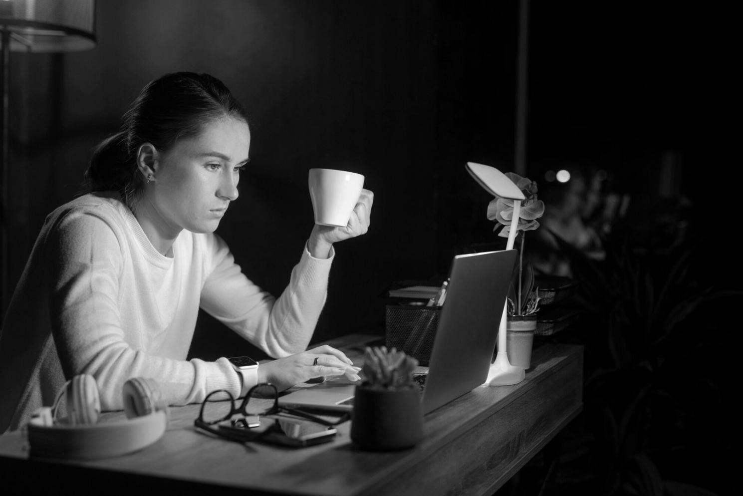 Students engaged in collaborative fundamental analysis session, working together on company valuation models